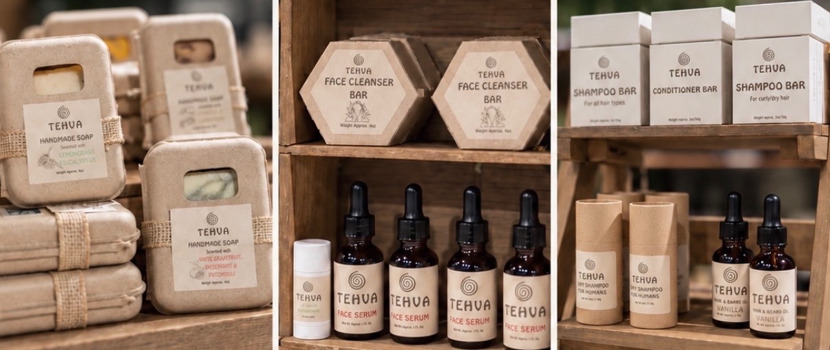 TEHVA handmade soaps, face cleanser bars, face serums, shampoo and conditioner bars, dry shampoo and hair & beard oil on wooden shelves